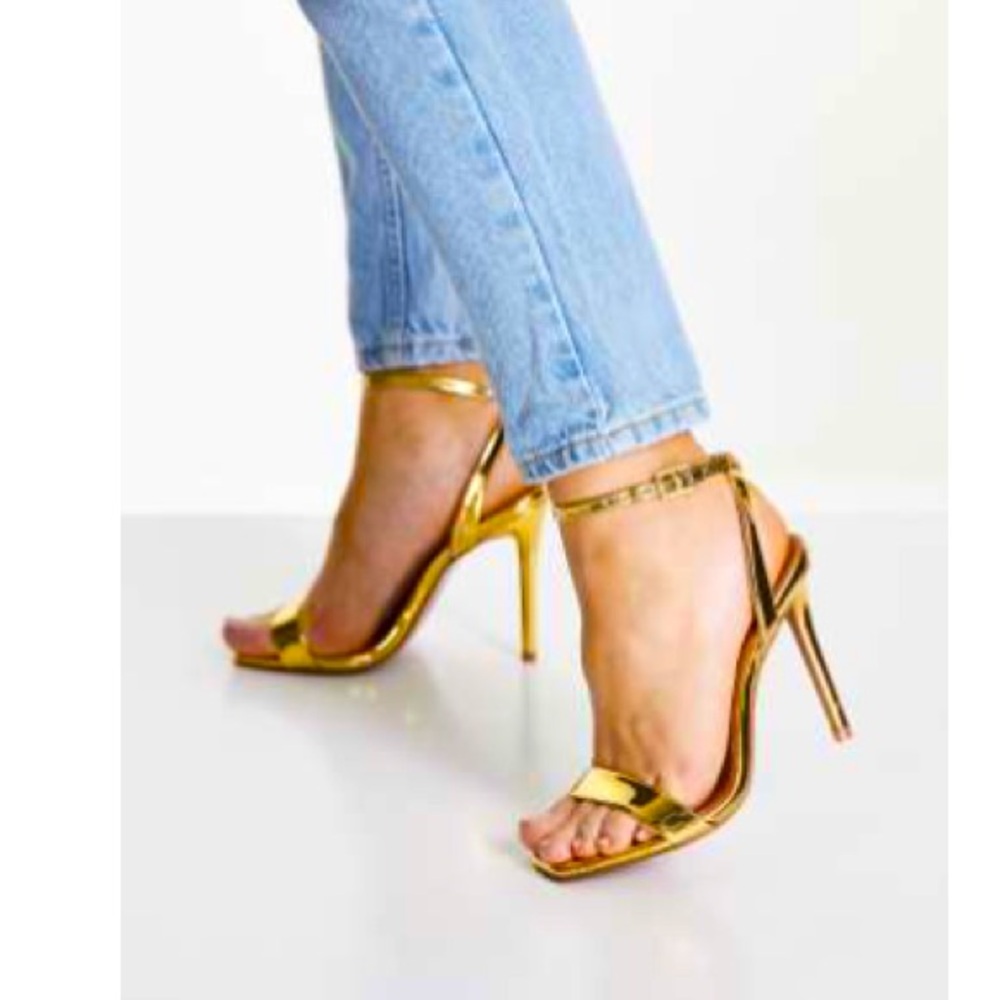 ASOS Design Neva barely there heeled sandals in gold.